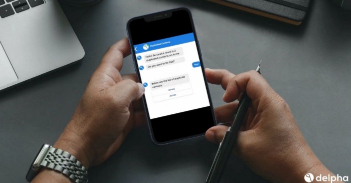 Salesforce administrator using Delpha on their smartphone